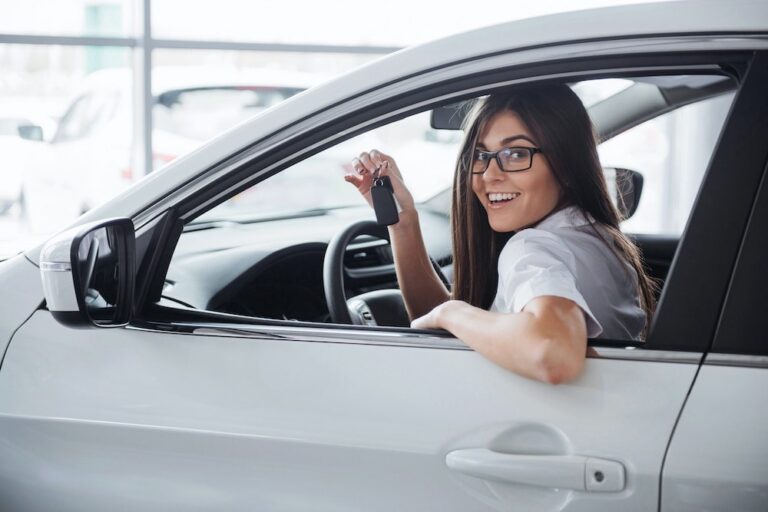15 Car Dealership BDC Email Templates 10 image of woman holding keys in her new car